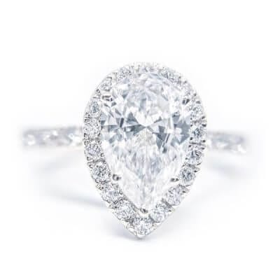 Classic Pear Shaped Halo Style Diamond Engagement Ring